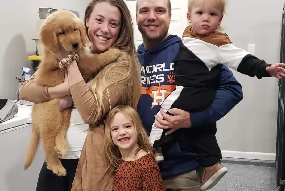 family adopting a puppy